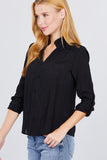 Blusa tejida con cuello en V y botones