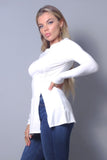 Blusa con aberturas y mangas largas elegante y chic para otoño