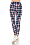 Stylish plaid leggings in pink and blue tones with high waist, form-fitting design, and full-length cut, worn with white sneakers on a plain background.