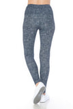 High-waisted yoga leggings with textured blue-gray fabric, showcasing a snug fit and full-length design, paired with white sneakers for a casual athletic look