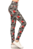 High-waisted yoga leggings with black, white, and red puzzle print pattern. Form-fitting design showcasing a unique geometric design, ideal for workouts or casual wear. Stretchy fabric hugs curves, offering comfort and style.