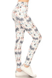 High-waisted yoga leggings with sailor-inspired print featuring palm trees, sailboats, and beach scenes. Light background with navy, coral, and blue accents. Form-fitting design showcasing the leg silhouette.